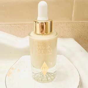 Charlotte Tilbury Gold and White Serum